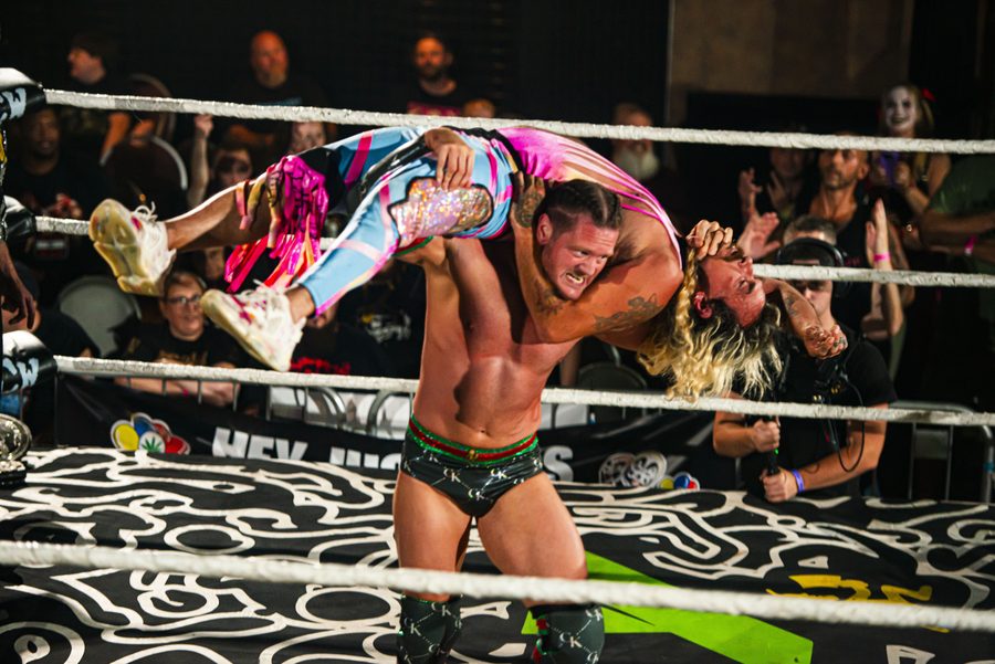 Caleb Konley hoisting an opponent in the JCW ring